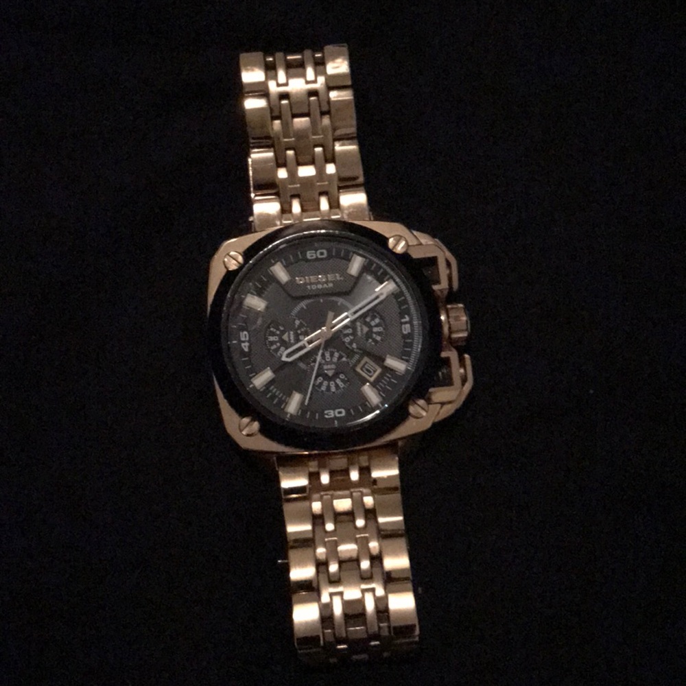 Used gold plated diesel watch